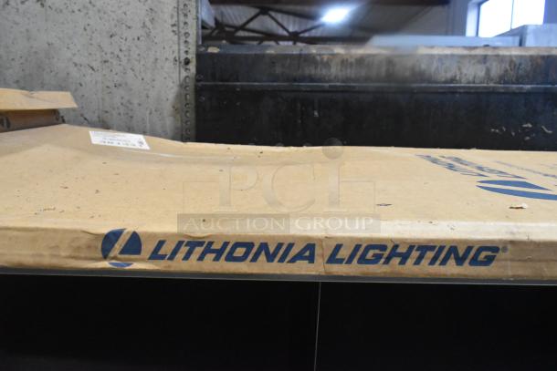 Lithonia Lighting L2GT A12 lens package for light fixture, new in box, logo visible on cardboard packaging.