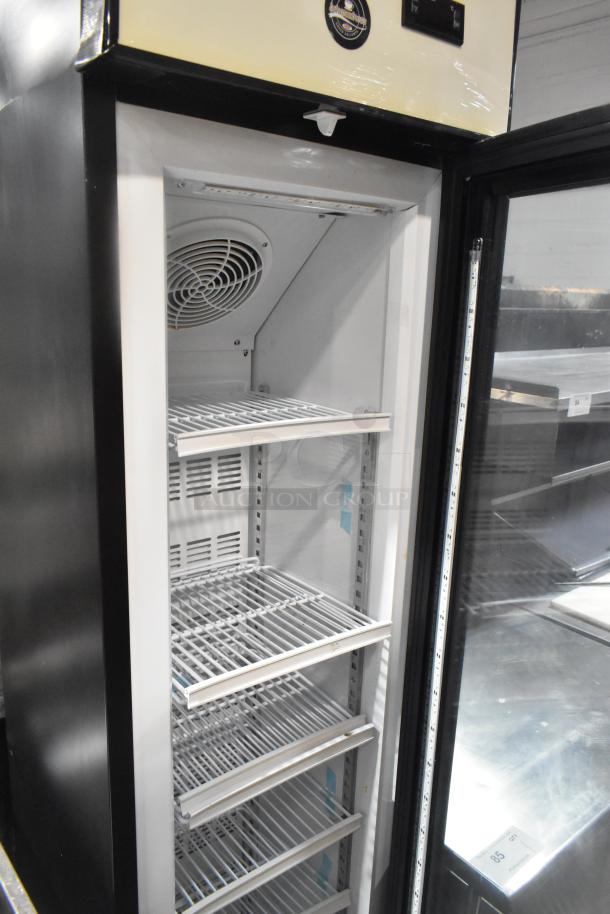 SD105B Commercial Single Door Reach-In Cooler, 115 Volts, excellent condition, with multiple wire shelves, visible cooling fan.