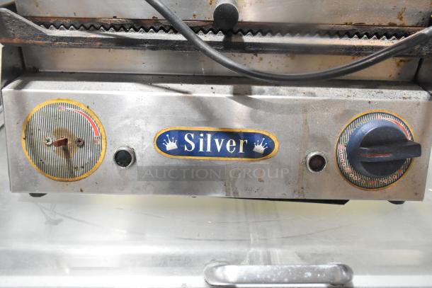 Isikgaz 2030-12 Commercial Panini Press, features "Silver" brand label. Operates on 220-230 volts, 1 phase. Used condition.