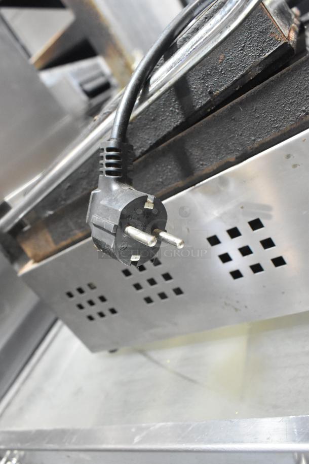 Isikgaz 2030-12 commercial countertop panini press, 220-230 volts, shown with European plug, in used condition, partial view.