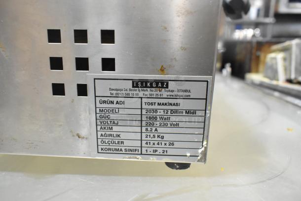 Isikgaz 2030-12 Panini Press, 220-230V, 1 Phase, commercial use, visible label with specifications, used condition.