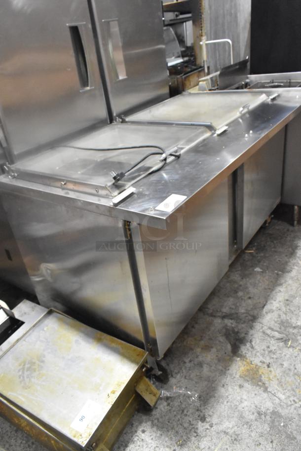 Beverage Air SPE60HC-24M-CL prep table on casters, stainless steel. Features: mega top, 115V, visible power cord, commercial use.