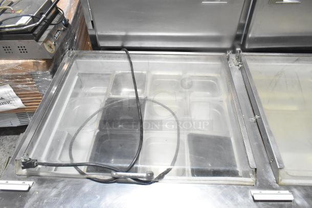 Beverage Air SPE60HC-24M-CL prep table, stainless steel, clear lids, food pans, on commercial casters, 115V, 1 Phase.