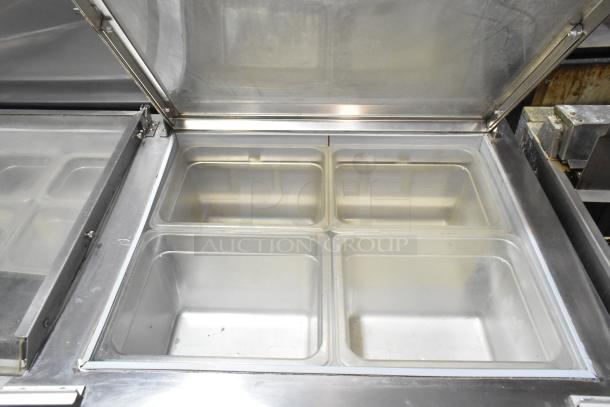 Beverage Air SPE60HC-24M-CL Commercial Prep Table with open top, multiple compartments, on casters, excellent condition.