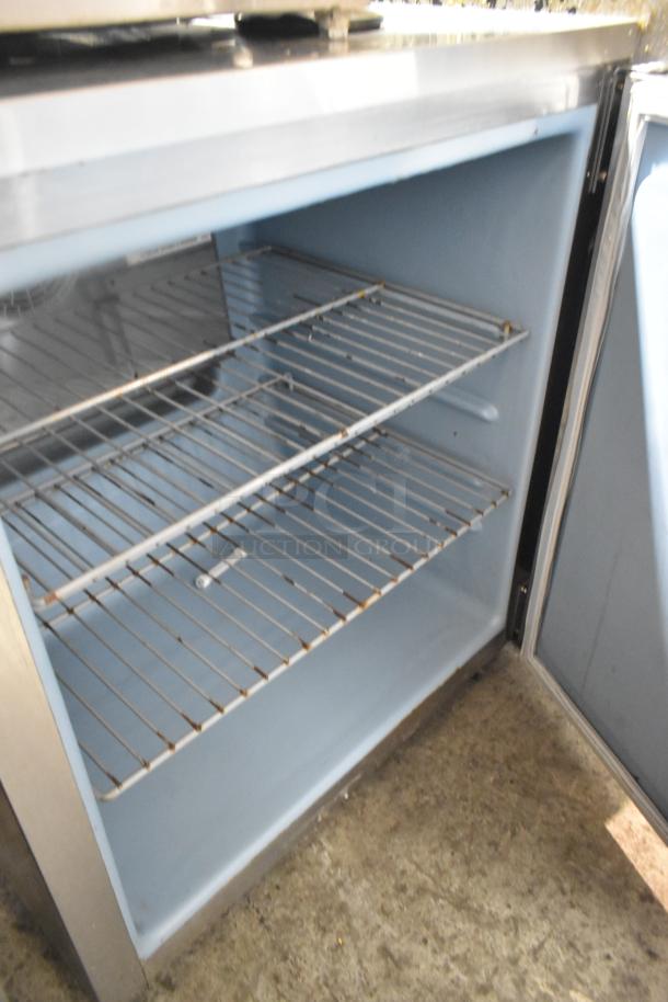 2017 Delfield 406CAP-DD1 undercounter cooler, single door, 115 volts, 1 phase, stainless steel, interior shelving, good condition.