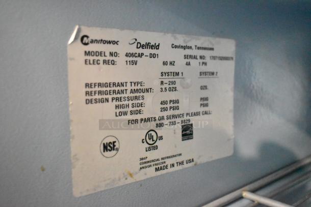 2017 Delfield 406CAP-DD1 single door undercounter cooler label showing model, voltage, and refrigerant details.