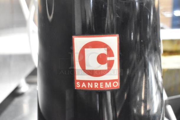 Sanremo SR50A commercial espresso bean grinder, black, missing lid. Features Sanremo logo. 115 volts, 1 phase power.