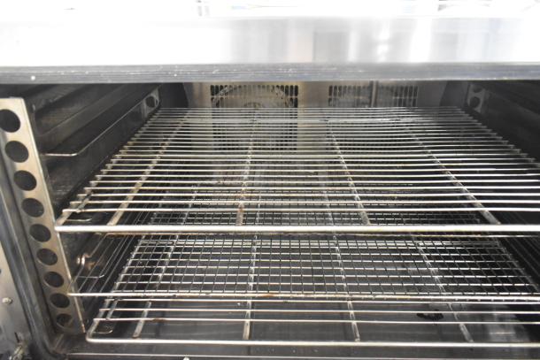 Empero EMP.PFE4-U convection patisserie oven, 208V, 1 phase, stainless steel interior, multiple racks, in good condition.