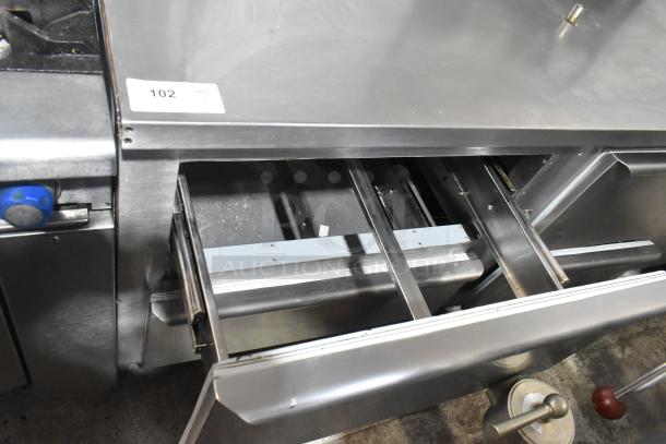 Commercial 4 Drawer Undercounter Cooler with sink bay. Stainless steel, 115 volts, 1 phase, showing open drawer detail.