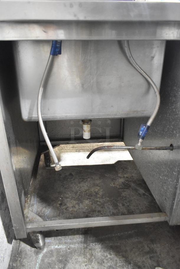 Commercial 4 Drawer Undercounter Cooler with integrated sink bay, stainless steel, 115V, 1 Phase, visible piping and connections.