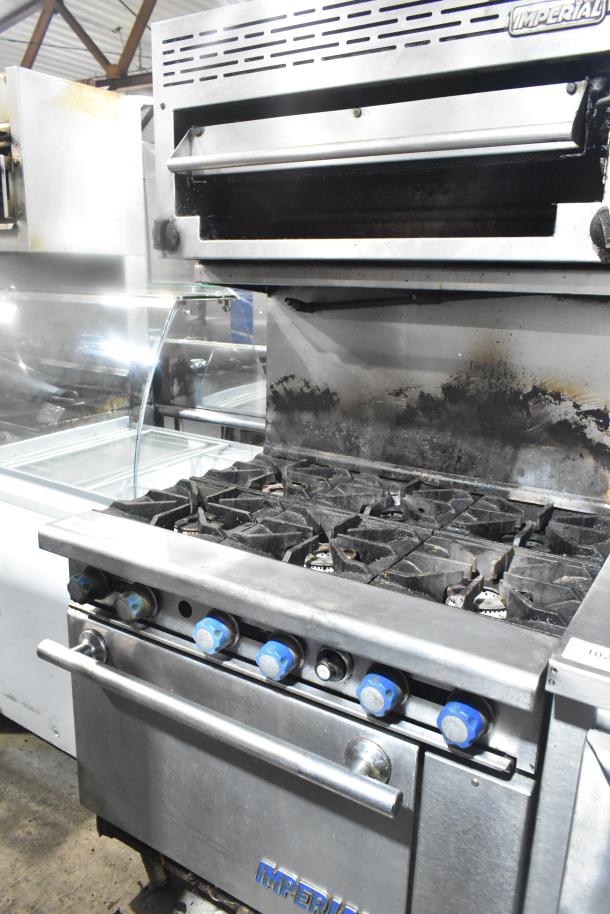 "Imperial commercial gas 6-burner range with salamander cheese melter and oven, stainless steel, used condition."