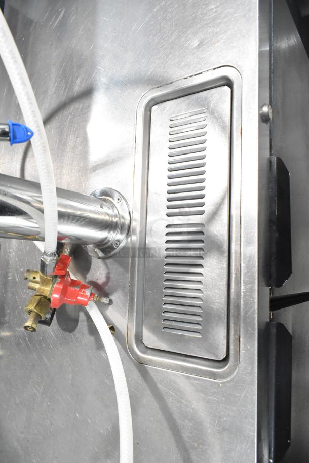 Beverage Air DD48Y-1-B kegerator, stainless steel surface with hose and valve connections visible, single tower model.