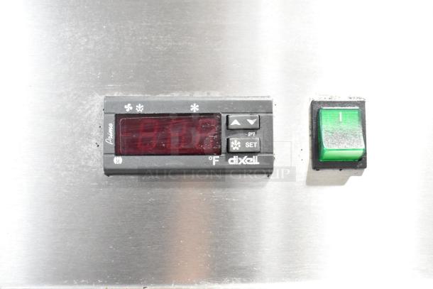 Alt text: Entree CF1-S freezer control panel with Dixell digital temperature display and green power switch.