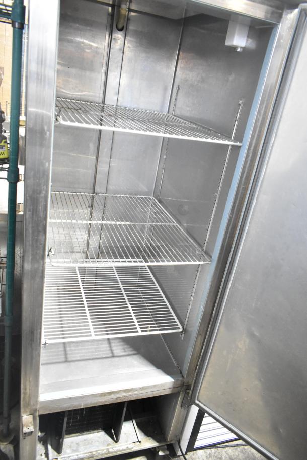 Entree CF1-S commercial single door reach-in freezer on casters, with three wire shelves, 115V, 1 phase, used.