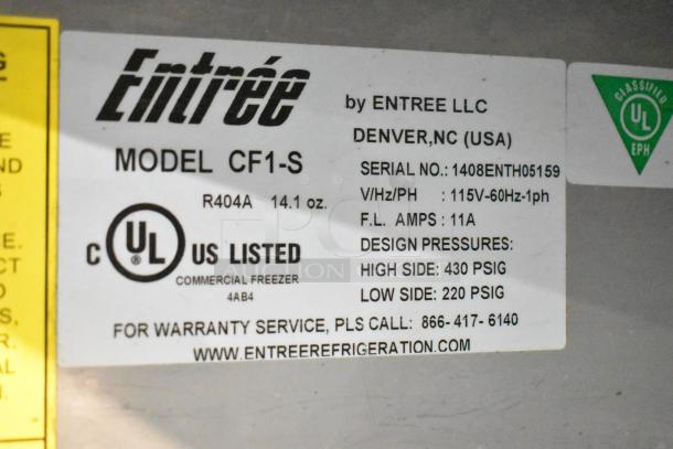 Close-up of label on Entree CF1-S Commercial Freezer. Shows model number, voltage, UL listing, and contact information.
