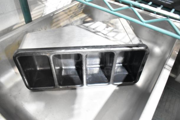 6 kitchen items including 5 steam pans and 1 server countertop 4-well holding bin, stainless steel, used condition.