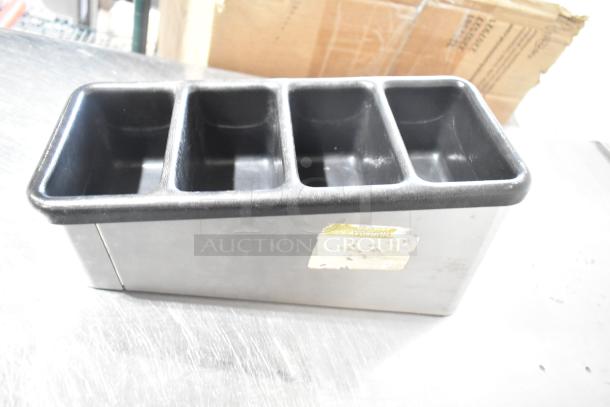 4-well holding bin in used condition with visible wear. It features a Husqvarna label indicating previous use.