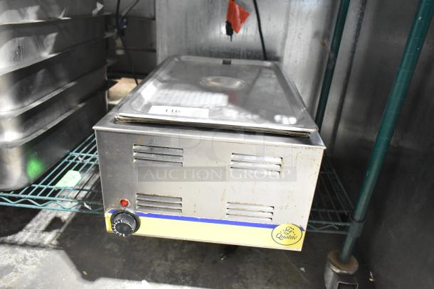 Qualite RDFW-1200NP commercial countertop food warmer, 120 volts, fair condition, visible branding label, and dial control.