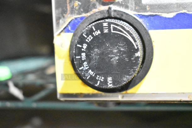 Qualite RDFW-1200NP Food Warmer dial, showing temperature settings from 104°F to 212°F, slightly worn condition.