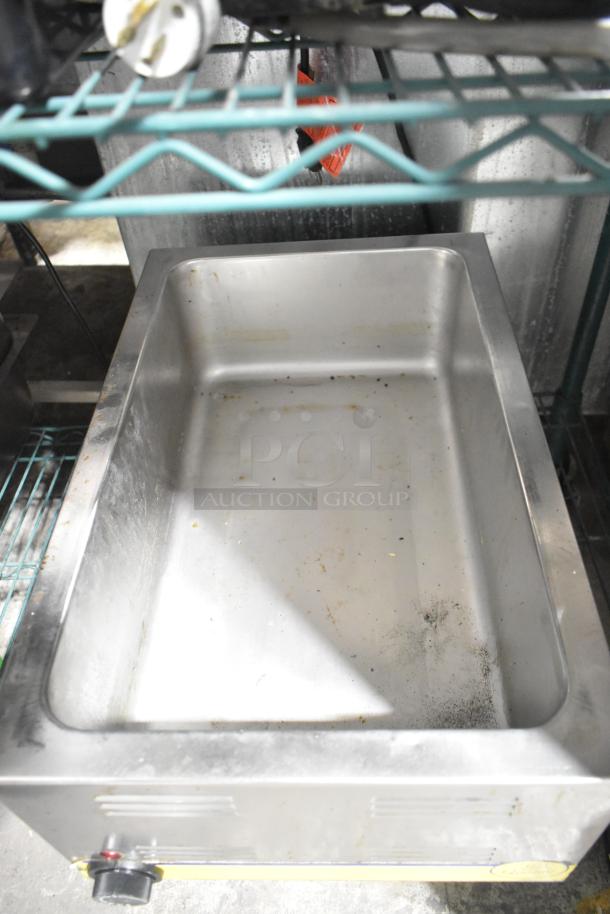 Qualite RDFW-1200NP Commercial Food Warmer, stainless steel, countertop model, 120 Volts, 1 Phase, visible wear.