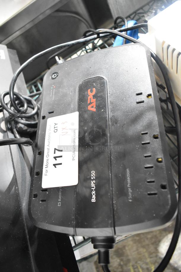 APC Back-UPS 550, visible wear, includes cables. Auction tag: Lot 117, QTY 3. Includes ThinkCentre monitor (not shown).