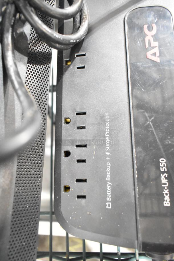APC Back-UPS 550 with battery backup and surge protection, visible wear. Part of 3-item auction including ThinkCentre monitor.