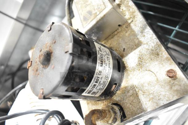 Hartell PAB-1 automatic condensate pump, 115 volts, 1 phase. Visible wear and rust. Label with specifications attached.