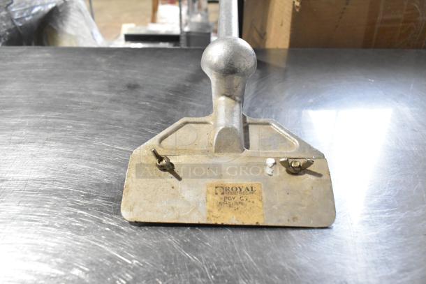 Metal grill scraper by Royal Industries with ergonomic handle and signs of wear. Label indicates model PGV G-5. Auction for two items.