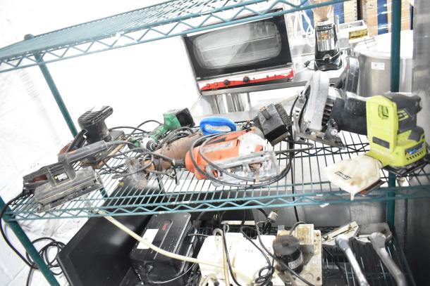 Assorted tools including angle grinder, Craftsman sander, Black and Decker sander/drill, Hitachi driver, Skilsaw saw on shelves.