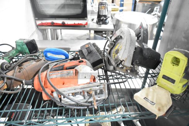 Various power tools on a shelf: angle grinder, Craftsman finishing sander, Black and Decker sander, Hitachi cordless impact driver, Black and Decker 3/8" drill, Skilsaw saw. Tools show wear.