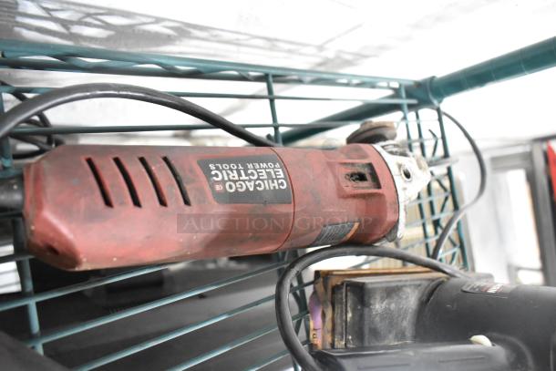 Auction lot with various tools including a Chicago Electric angle grinder, visible in used condition.