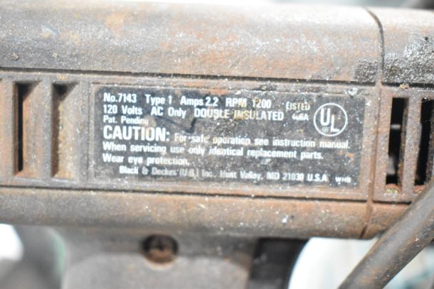 8 assorted tools including an angle grinder, Craftsman sander, Black and Decker sander and drill, Hitachi impact driver, and Skilsaw. Features visible on Black and Decker label: Model No. 7143, 120V, 2.2 Amps, 1200 RPM, double insulated. Condition suggests use but details are clear.