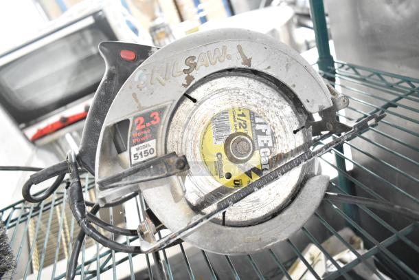 Skilsaw Model 5150 with visible label showing 2.3 horsepower, used condition on a metal shelf.