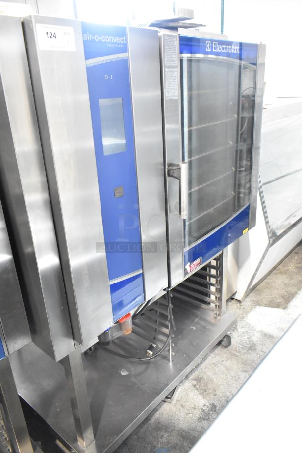 Electrolux Air-o-convect Touchline 9F92225200 commercial convection oven on stand with casters, stainless steel, glass door.