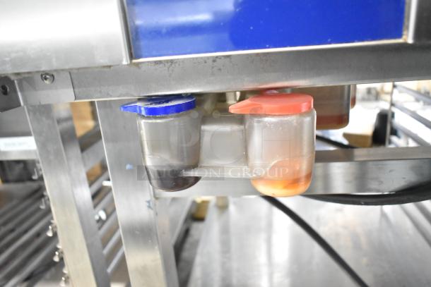 Electrolux Touchline 9F92225200 convection oven, stainless steel stand with casters, shown with fluid containers attached.