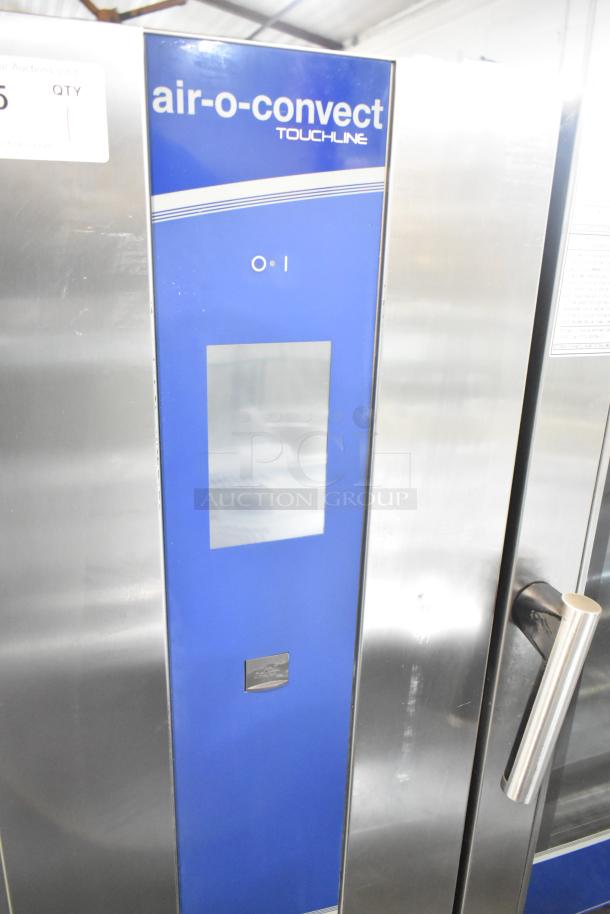 Electrolux Air-o-convect Touchline commercial oven model 9F92225200, with control panel and stainless steel exterior on stand with casters.