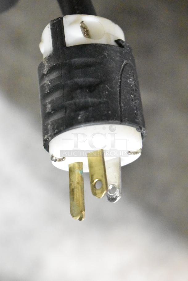 Close-up of a plug from the Electrolux Air-o-convect model 9F92225200 commercial convection oven.