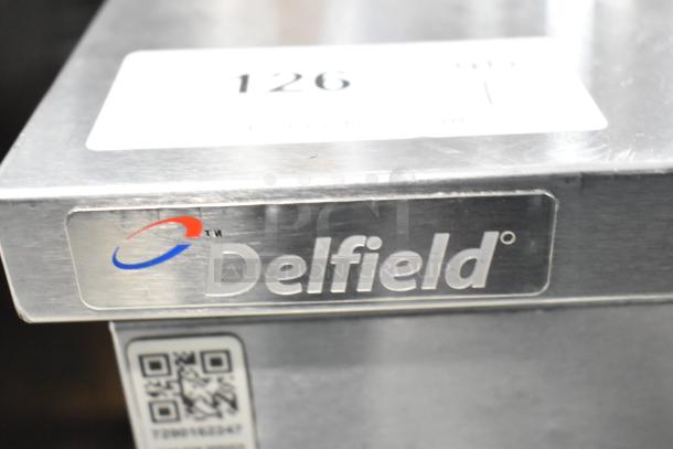 2017 Delfield 406P-STAR2 undercounter cooler, stainless steel, visible Delfield logo, barcode label, 115V, 1 phase.