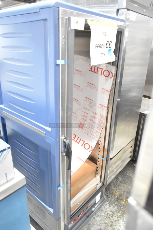 BRAND NEW Metro C539-HLFC-U C5 hot holding cabinet, blue, on casters, missing glass. Scratch and dent condition.