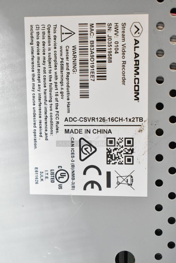Alarmcom Stream Video Recorder ADC-CSVR126-16CH-1x2TB, label details, includes warning and certification markings.