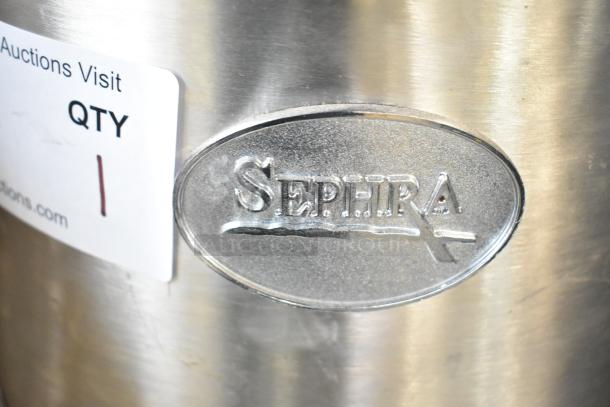 Sephra CF27 Countertop Fountain, stainless steel. Model CF27, 115 volts, 1 phase. Visible Sephra logo and auction tag.