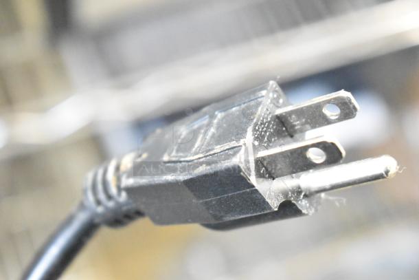 Close-up of the power plug from a Sephra CF27 Countertop Fountain.