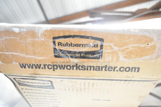 Brand new Rubbermaid Sturdy Chair Tray box with visible scratches and dents. Features Rubbermaid and website logos.