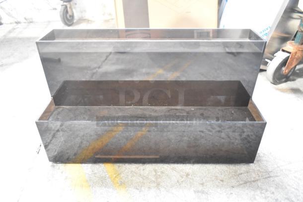 Industrial lid dispenser in black acrylic, rectangular with dual compartments, excellent condition, part of 7-item auction lot.