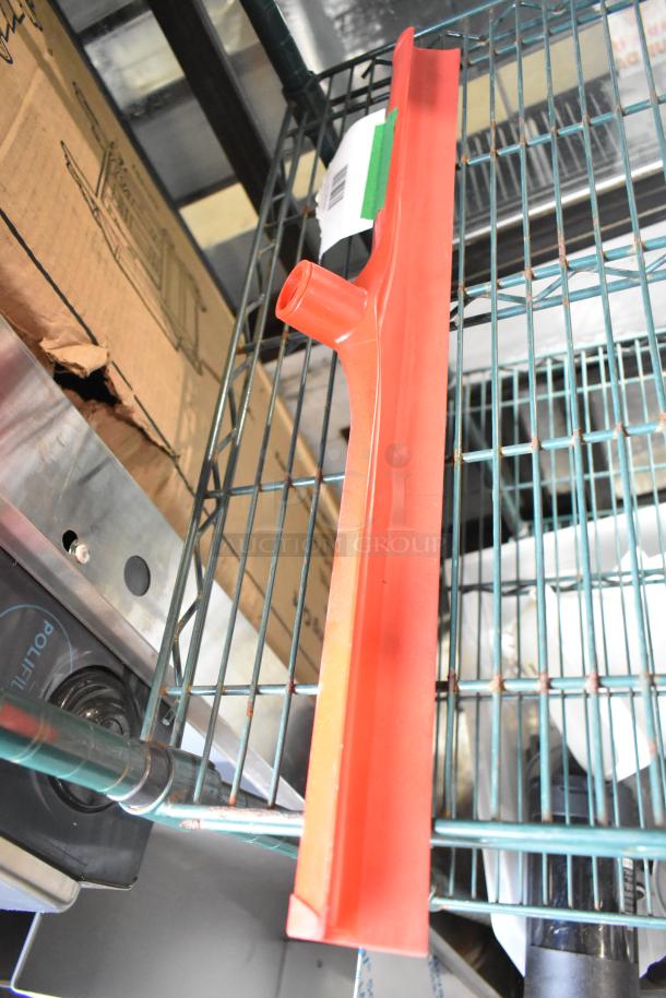 Brand new Carlisle Sparta 24" red rubber squeegee. Plastic frame, single blade. Includes label with model 27136568RD.