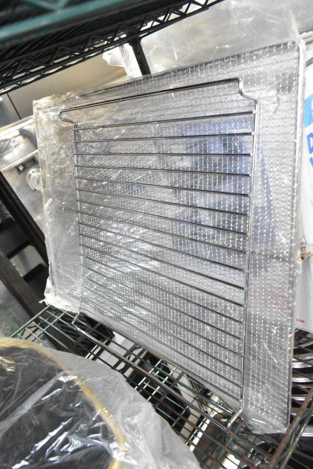 Brand new Carlisle 3656805 Sparta 24" red rubber squeegee with plastic frame, visible in packaging. Includes rack.