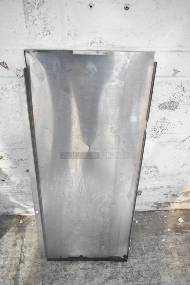 Metal panel, slightly tarnished, part of a lot including blue poly rack. Auctioned as "ALL ONE MONEY!" tier lot.