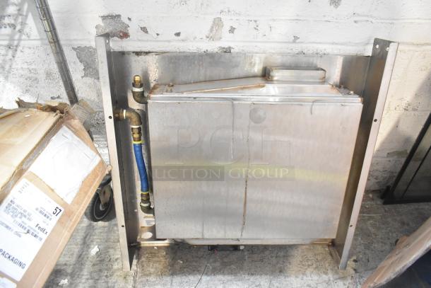 Auction lot featuring various metal pieces and a blue poly rack, used condition, includes boxed items with labels.