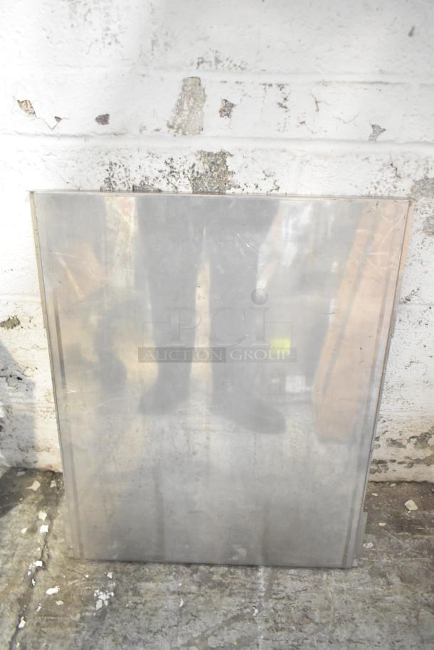 ALL ONE MONEY! Tier lot including metal pieces and a blue poly rack in used condition. Suitable for various applications.