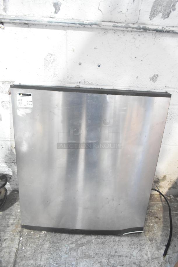 Alt text: Metal panel with label, part of ALL ONE MONEY! tier lot, features potential for various uses, includes blue poly rack.